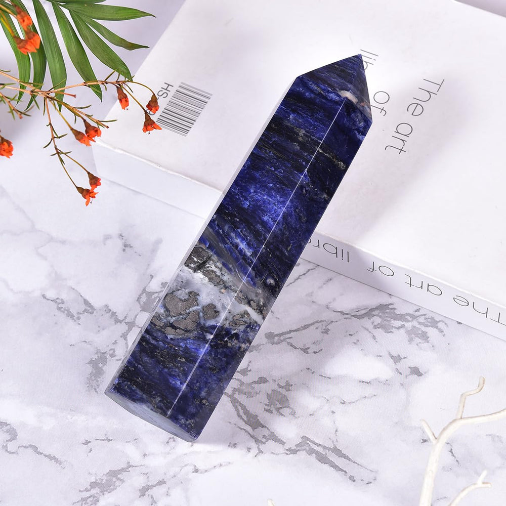MOGEMT blue sodalite crystal tower six-faceted point for focused energy work.