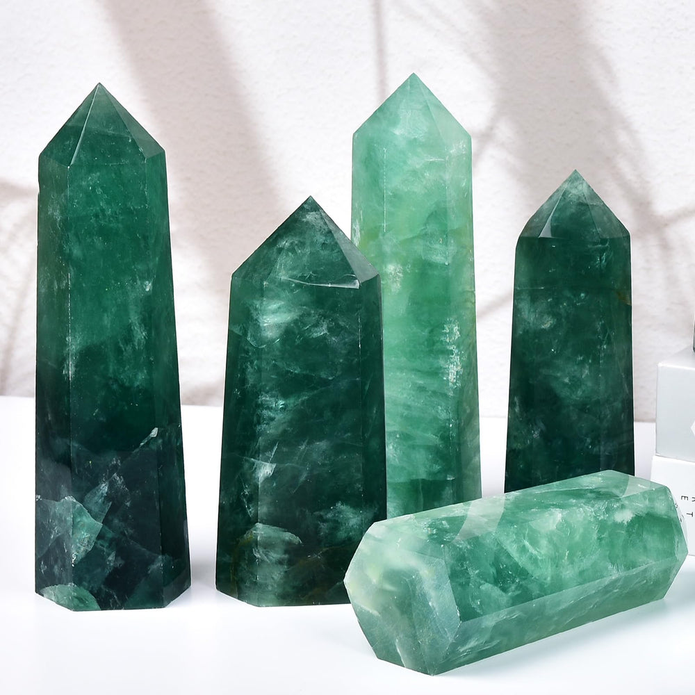 MOGEMT green fluorite obelisk weight label indicates handcrafted, natural gemstone with 1-1.5 lb heft