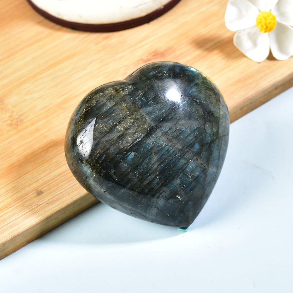 MOGEMT Labradorite heart crystal on body use demonstrates practical grounding.