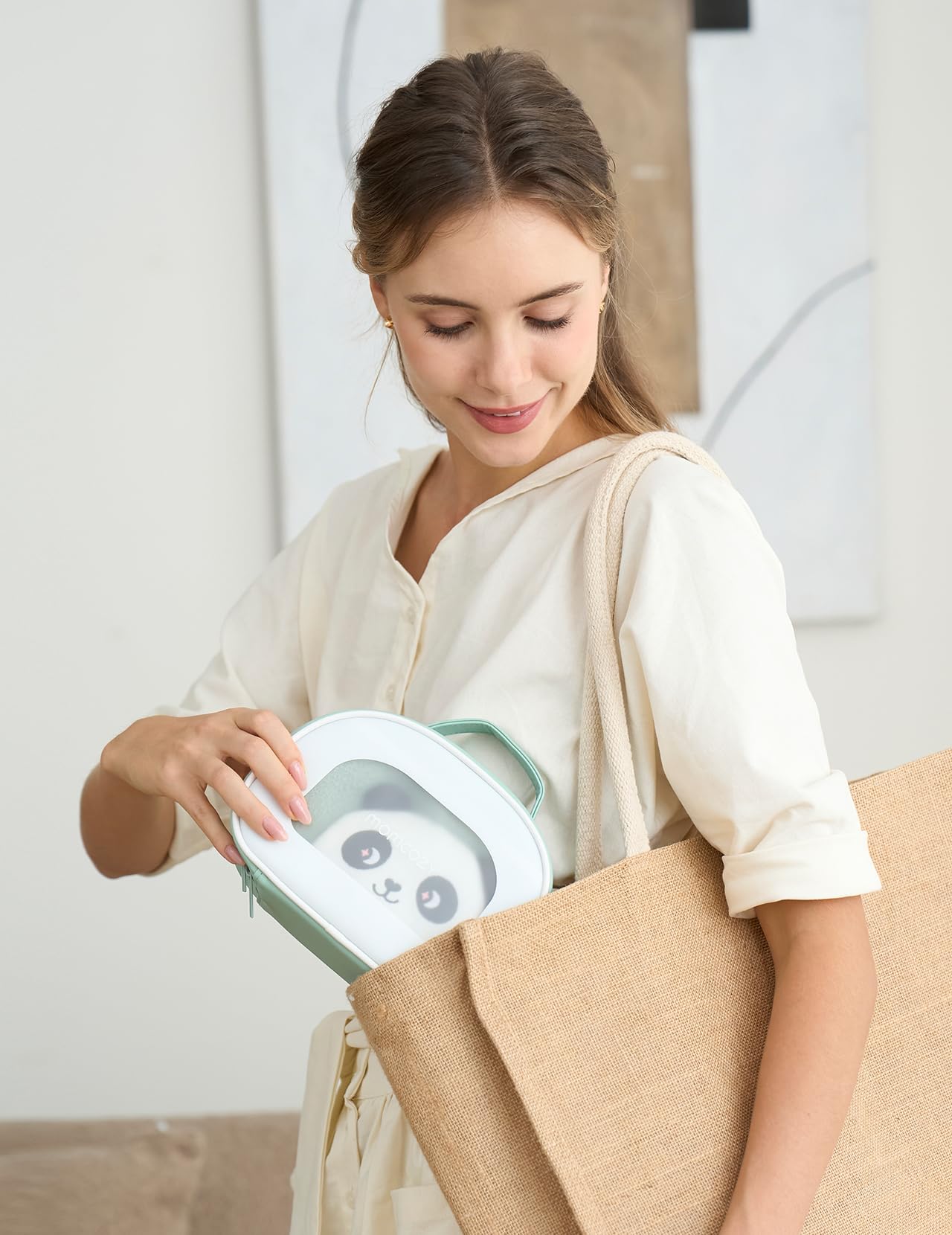 Momcozy Elite Baby Kit finger toothbrush for easy cleaning.