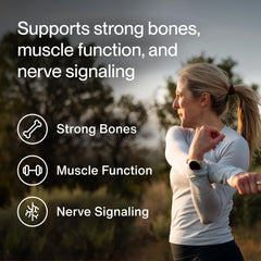 Momentous Calcium label closeup highlighting gluten-free and NSF-certified sport quality.