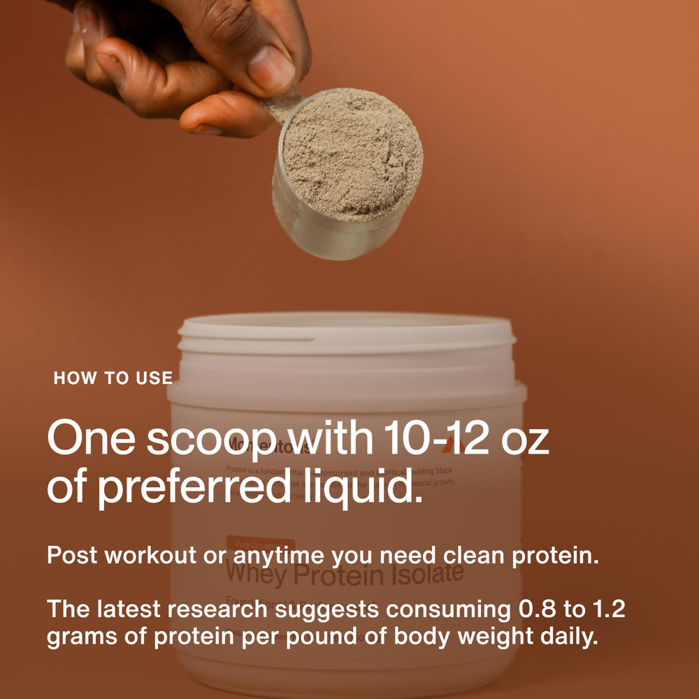 Momentous Essential Whey powder pour – quick protein addition after workouts.