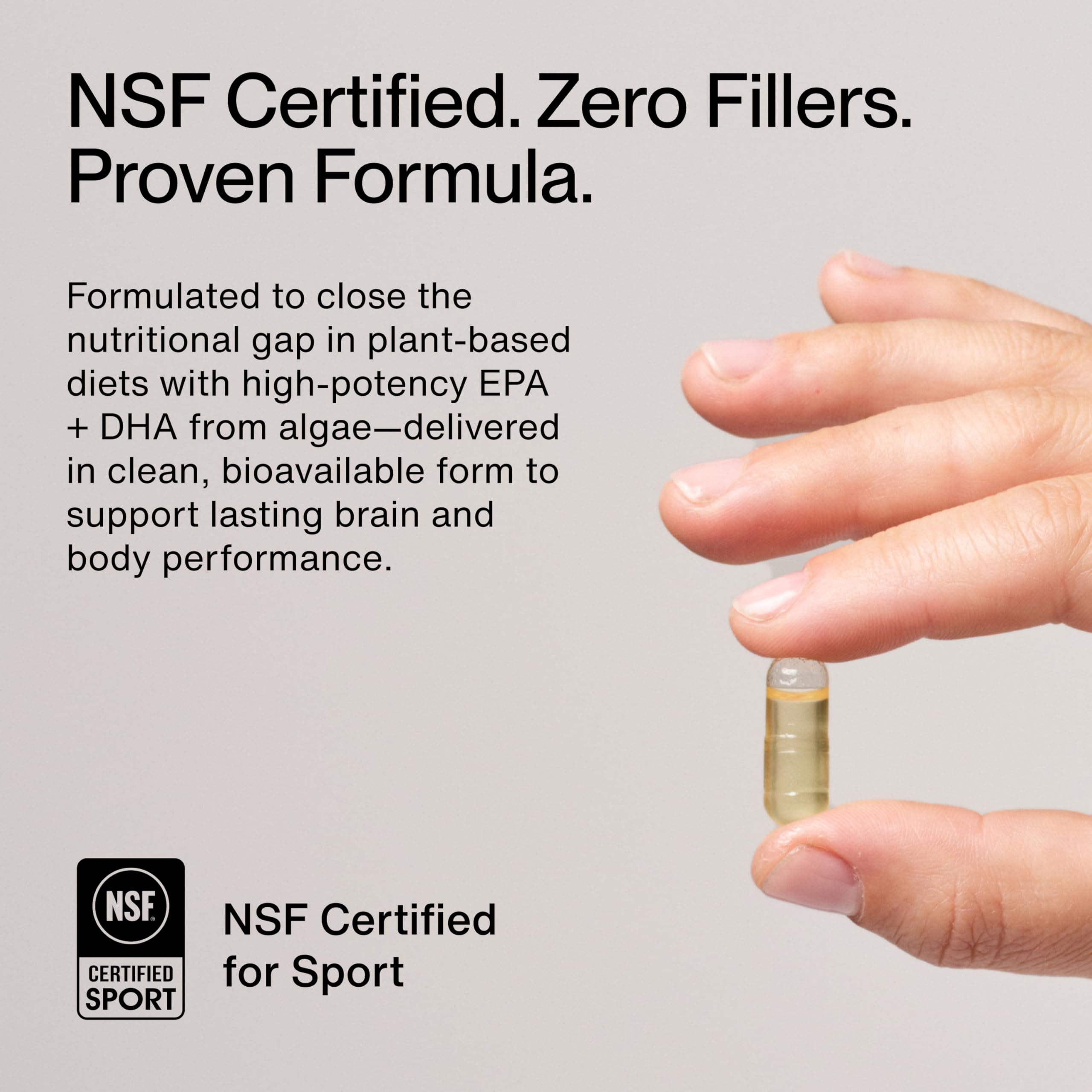 Momentous Vegan Omega-3 capsules spilled to illustrate easy-to-swallow softgels.