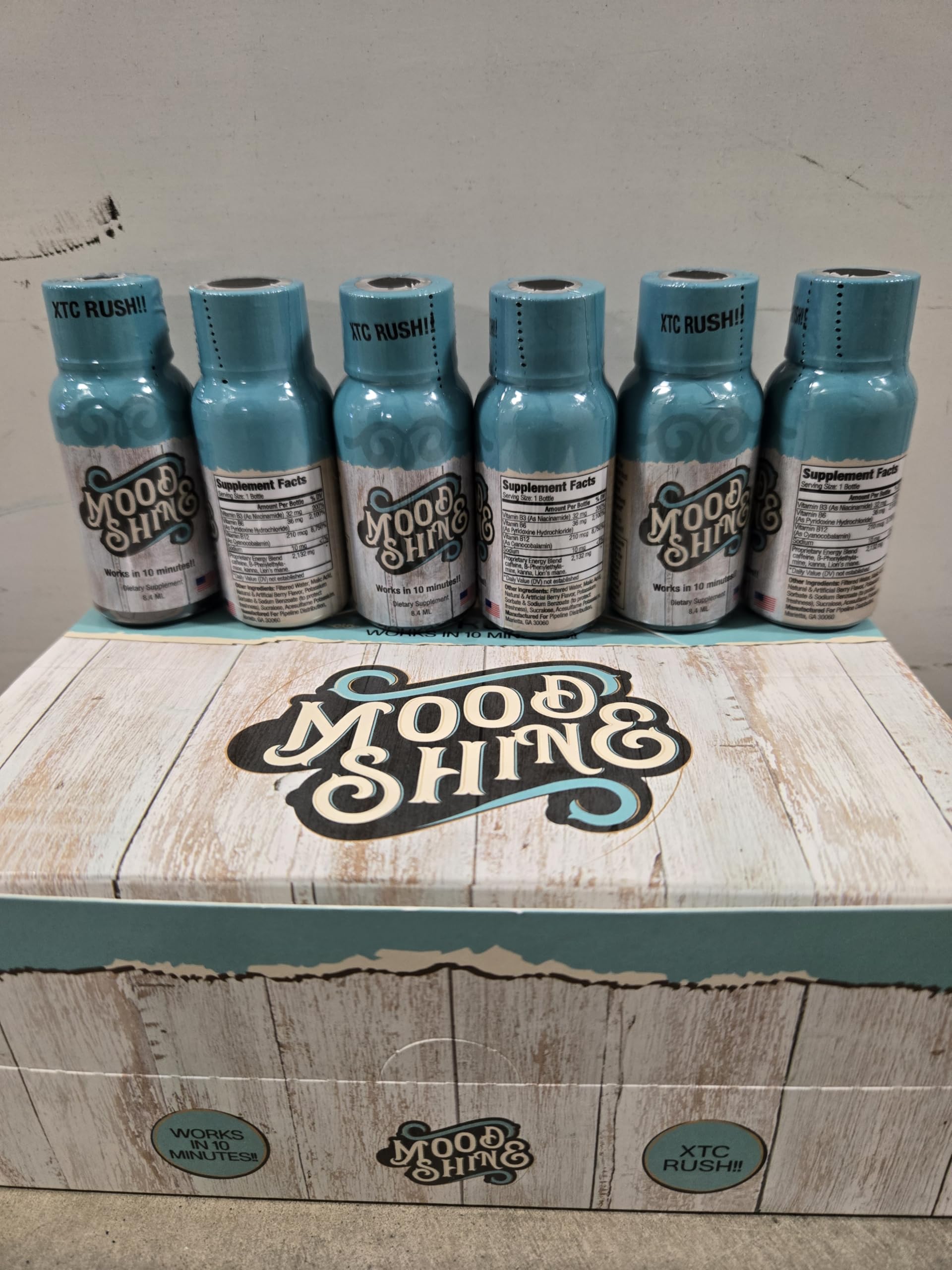 Mood Shine energy bottle in turquoise, ready to boost focus on the go