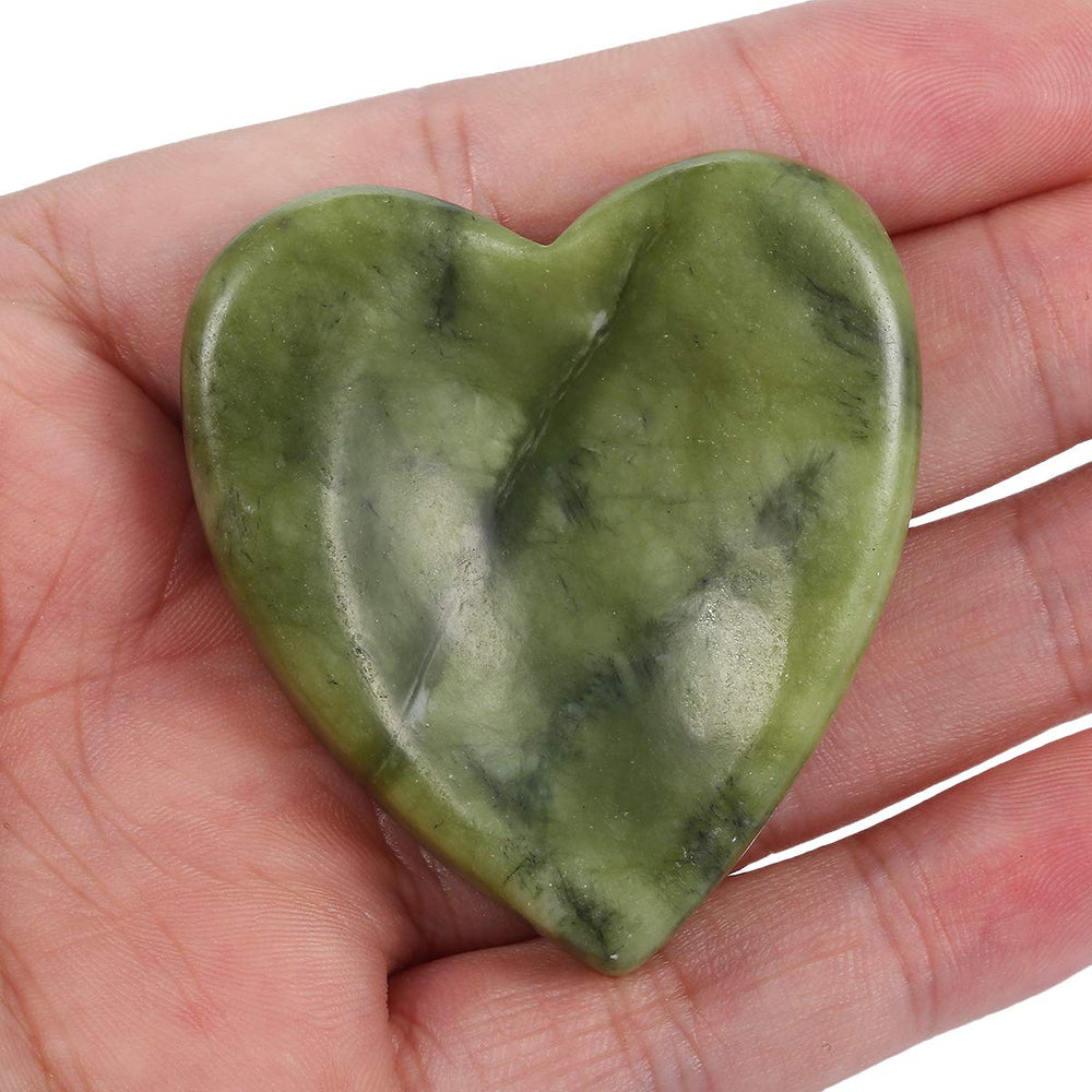 mookaitedecor green jade thumb stone close-up, smooth surface for relaxation