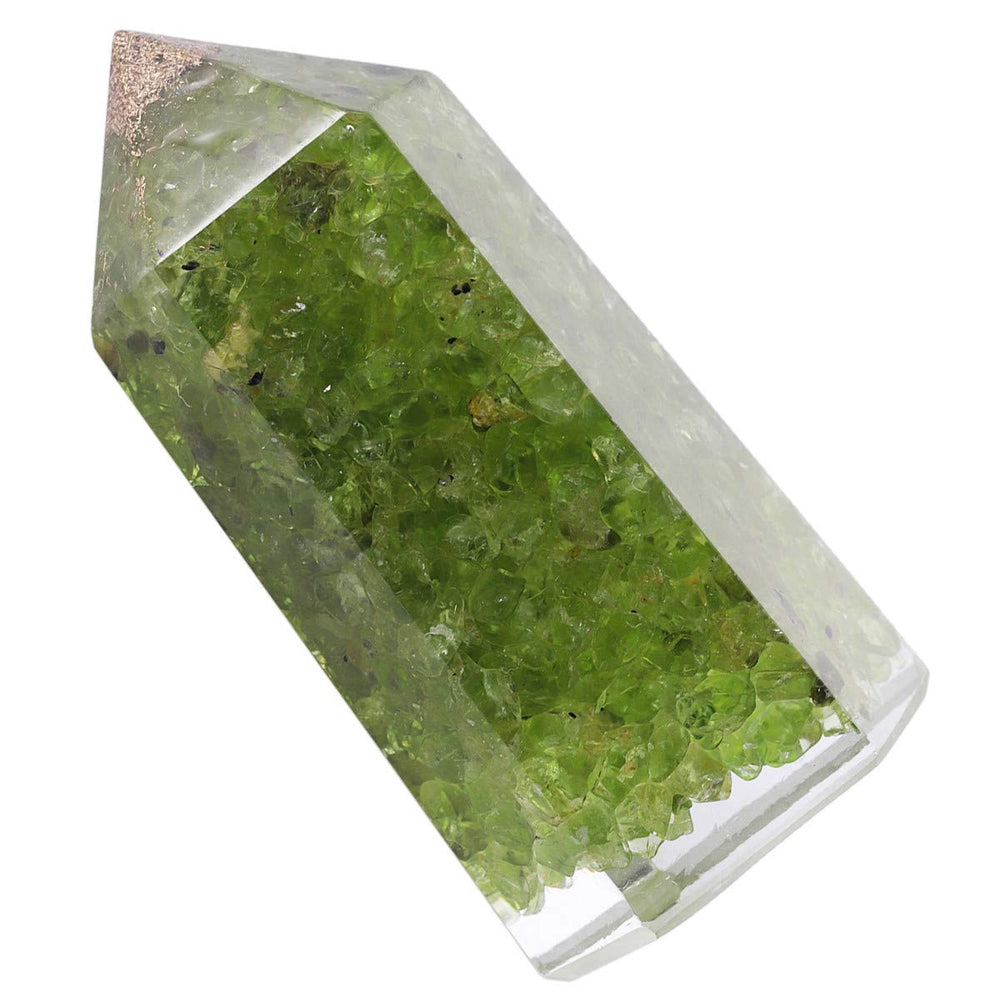 Mookaitedecor peridot wand used in Reiki and meditation sessions.
