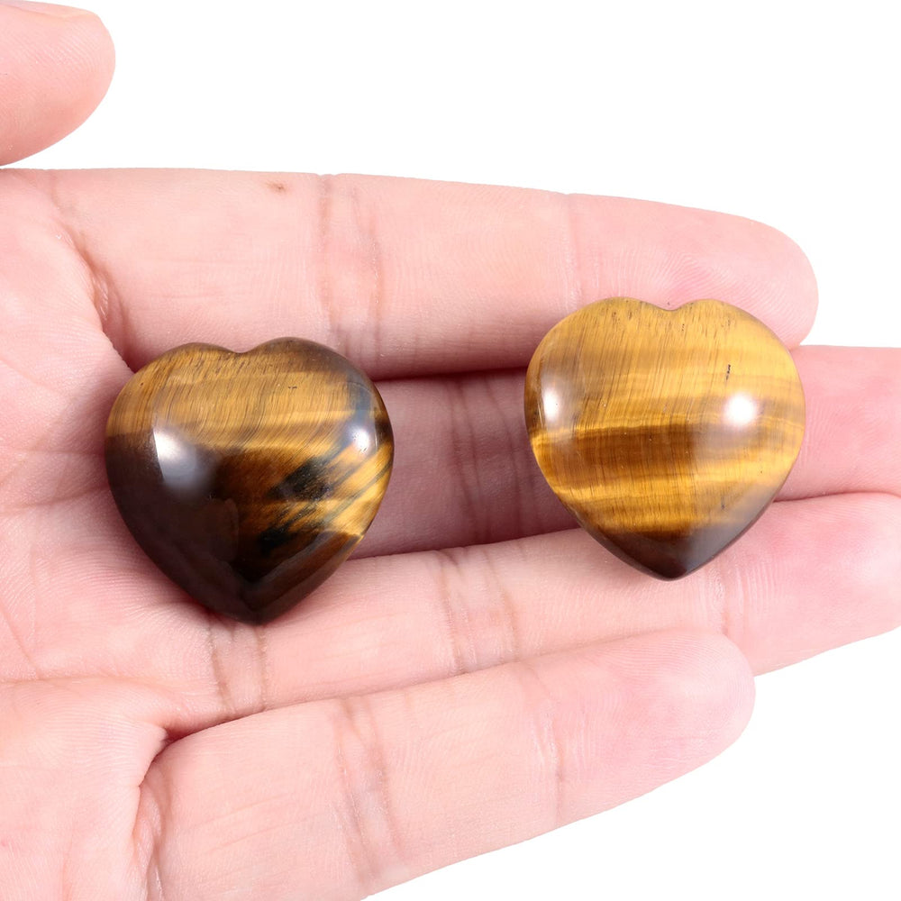 mookaitedecor tiger's eye heart stone close up shows polished texture and warm glow