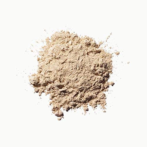 Moon Juice Ashwagandha powder jar ready to blend into coffee.