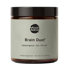 Moon Juice Brain Dust bottle on shelf, caffeine-free focus support.