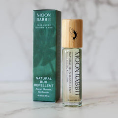 Moon Rabbit Acupuncture bug-repellent roller 10ml for outdoor protection.