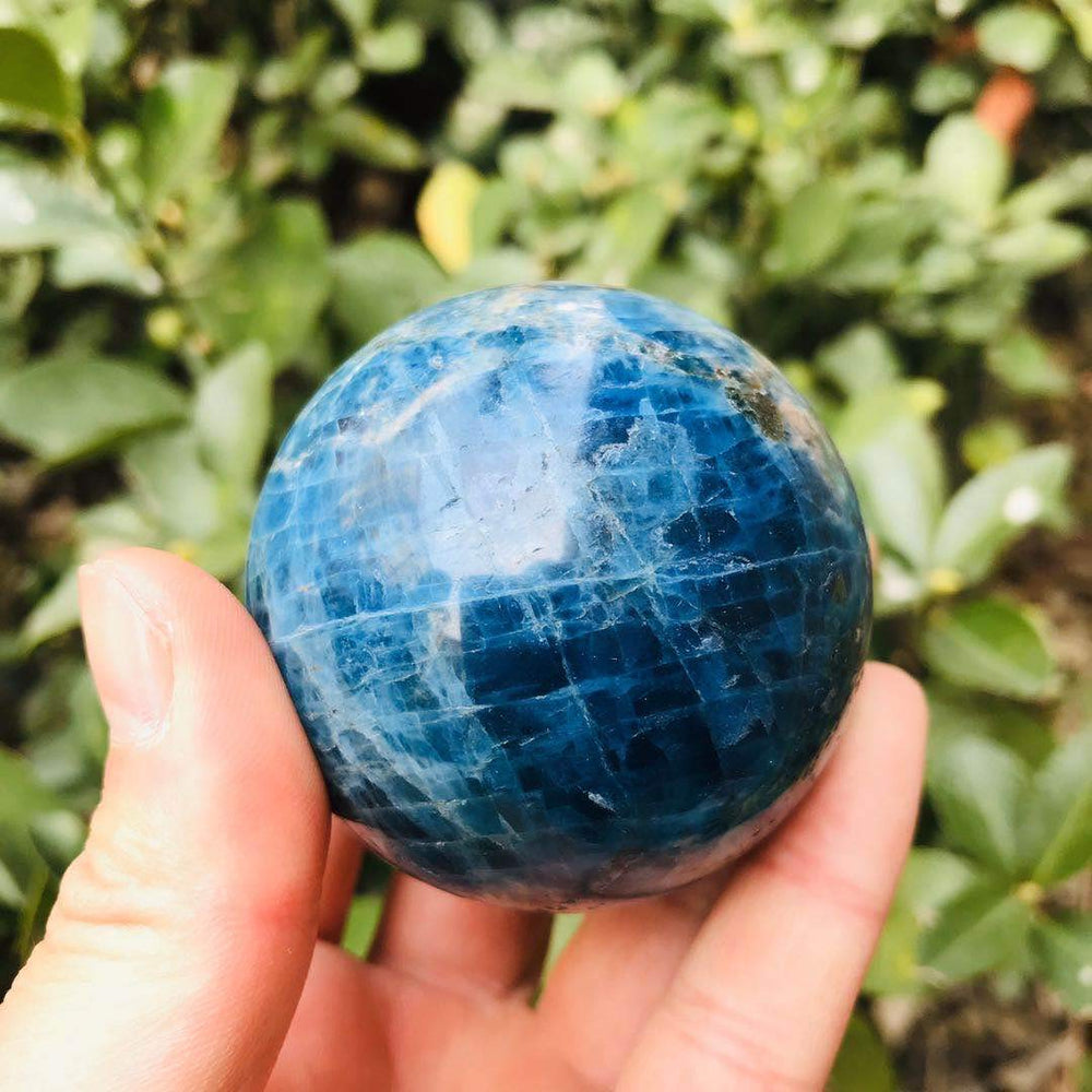 MoonlightCrystal blue apatite sphere enhances ambience on coffee tables