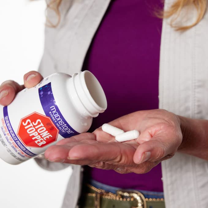 Moonstone Stone Stopper Label on bottle communicates doctor-created formula for kidney health.