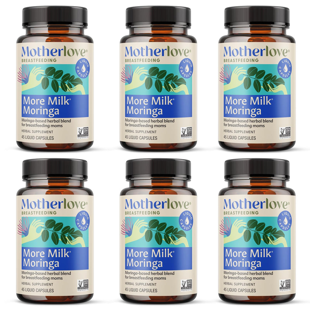 Motherlove More Milk Moringa bottle closeup highlighting organic herbal blend for nursing support.