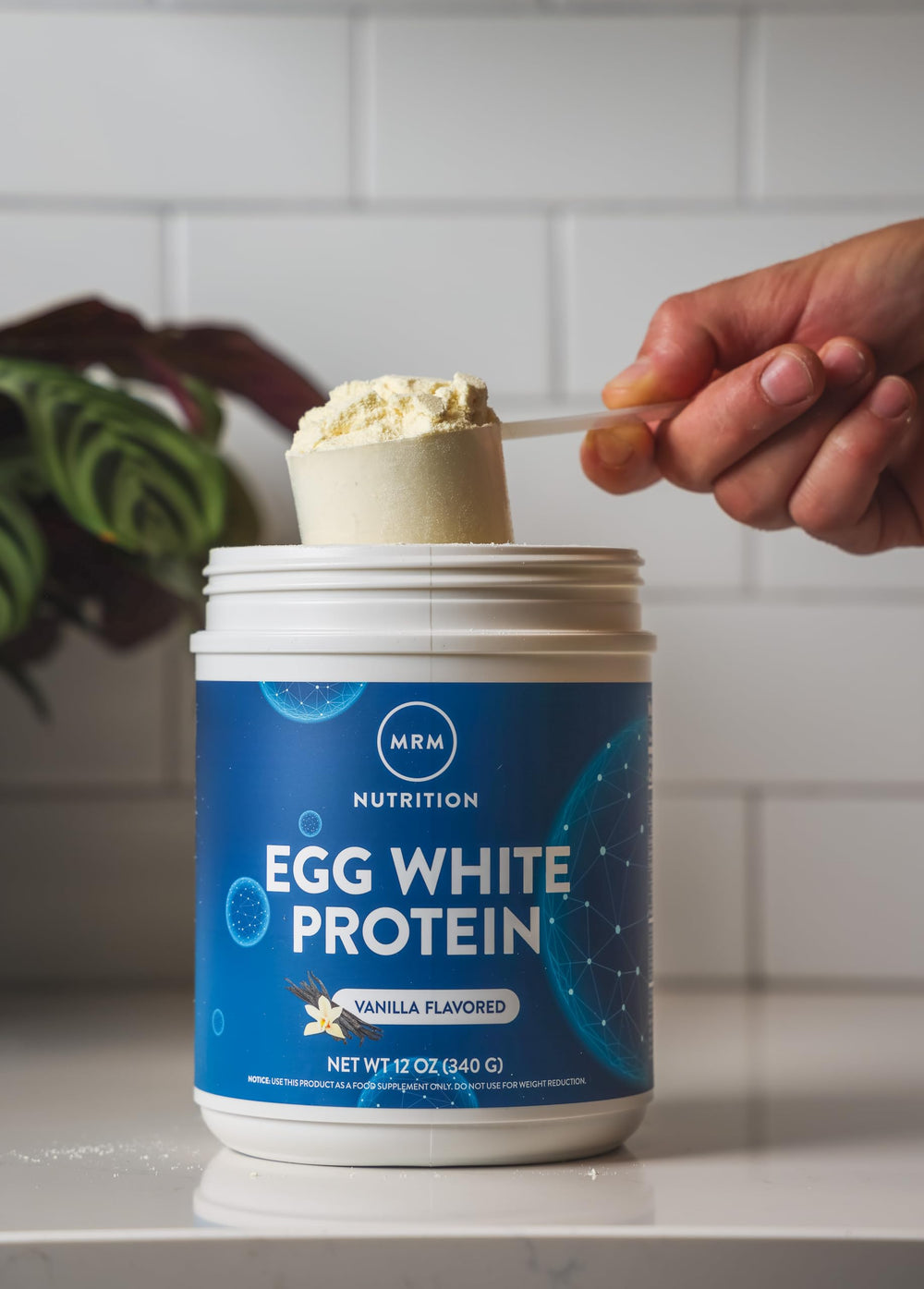 MRM Egg White Protein Vanilla serving cup emphasizes convenient daily use