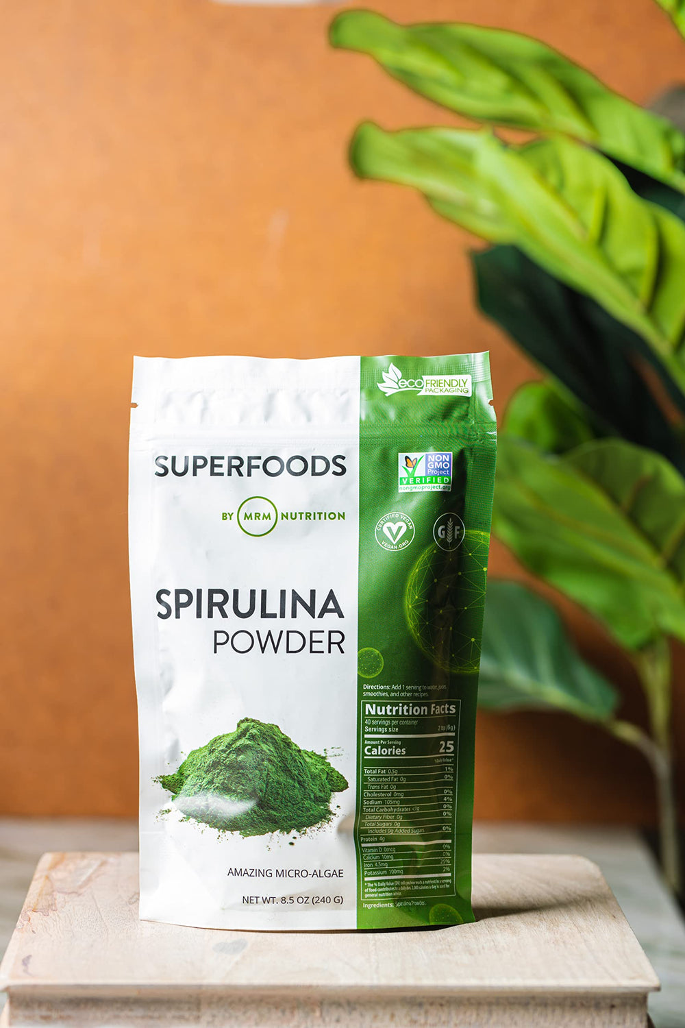 MRM Spirulina Powder bottle on shelf, convenient gluten-free vegan nutrition option.