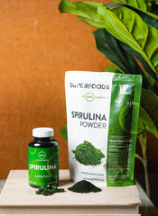 MRM Spirulina powder close-up showing powder pouring for easy shakes.