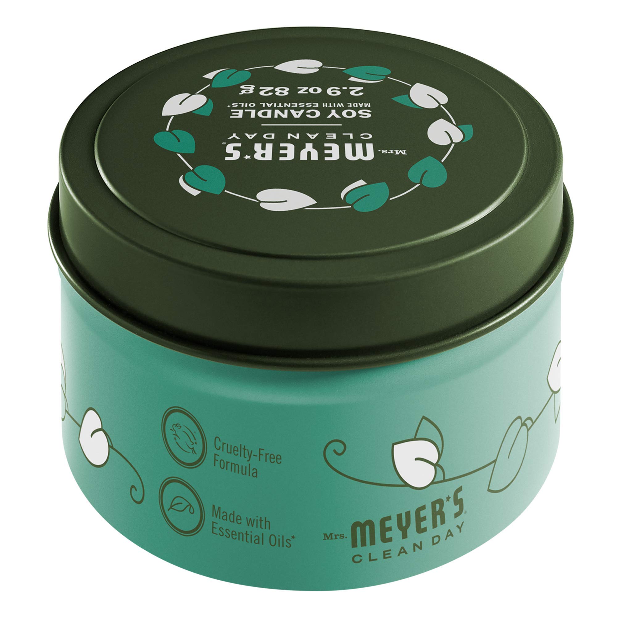 Mrs. Meyer's Basil Tin Candle in a decorative tin enhances kitchens with garden basil aroma.