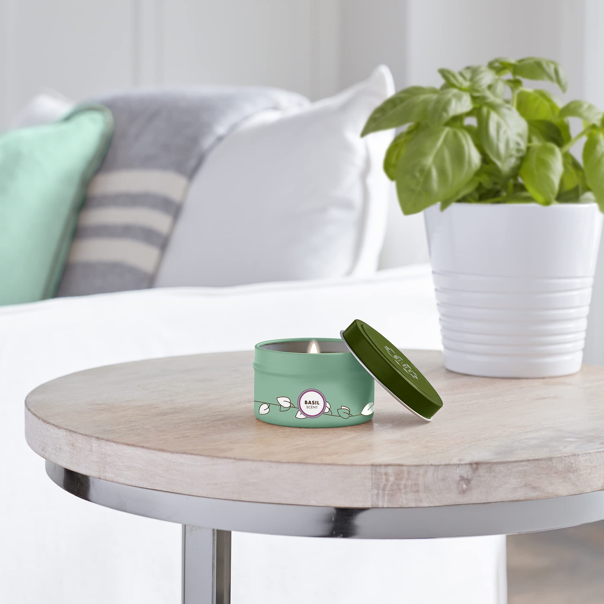 Mrs. Meyer's Basil Tin Candle creates a refreshing, herbaceous ambience for everyday routines.
