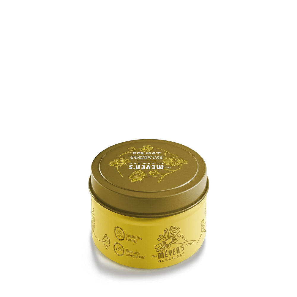 Mrs. Meyer's Daisy Tin Candle, side view, long-lasting fragrance for busy cleaning sessions.