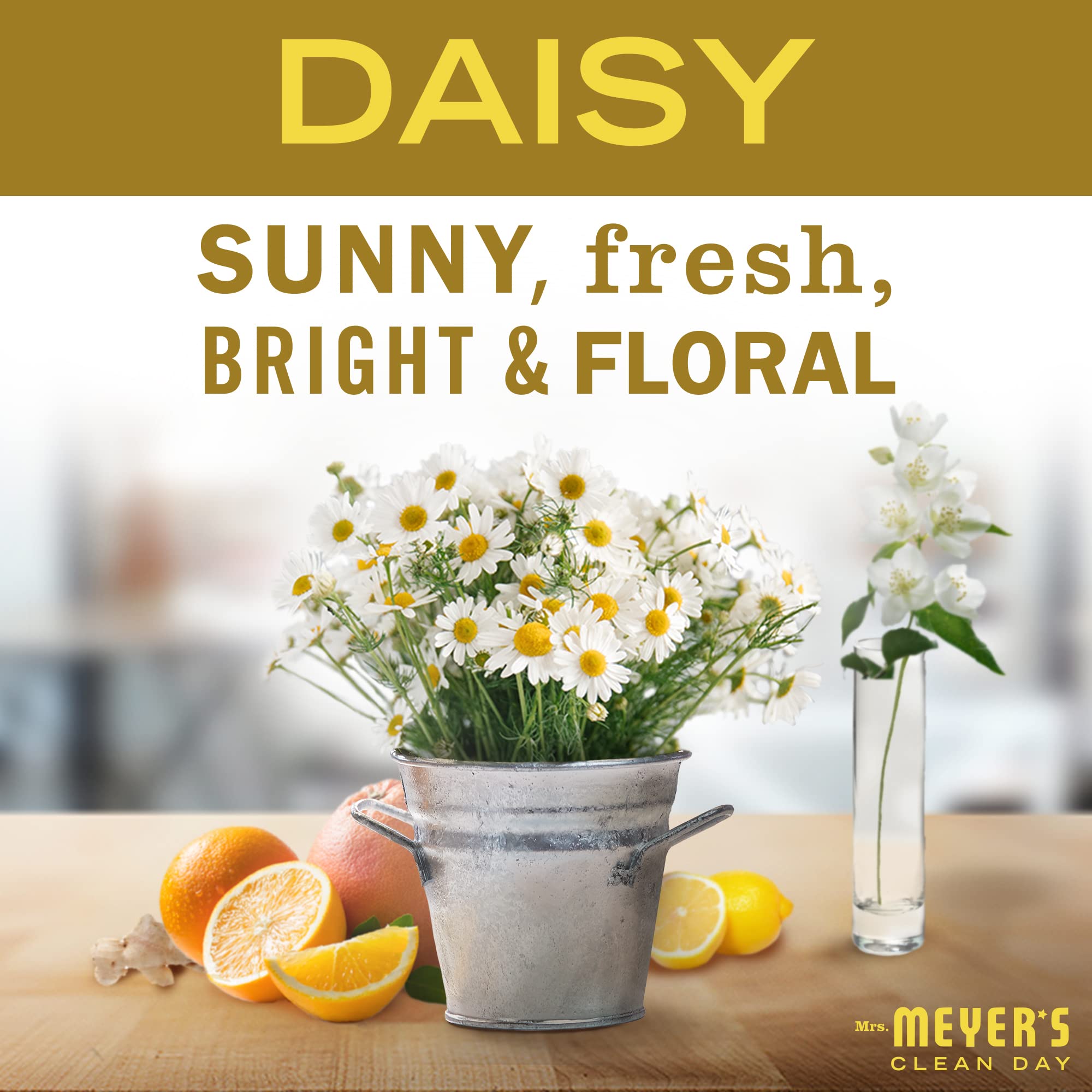 Mrs. Meyer's Daisy Tin Candle, close-up of soy wax, plant-based formula for clean burning.