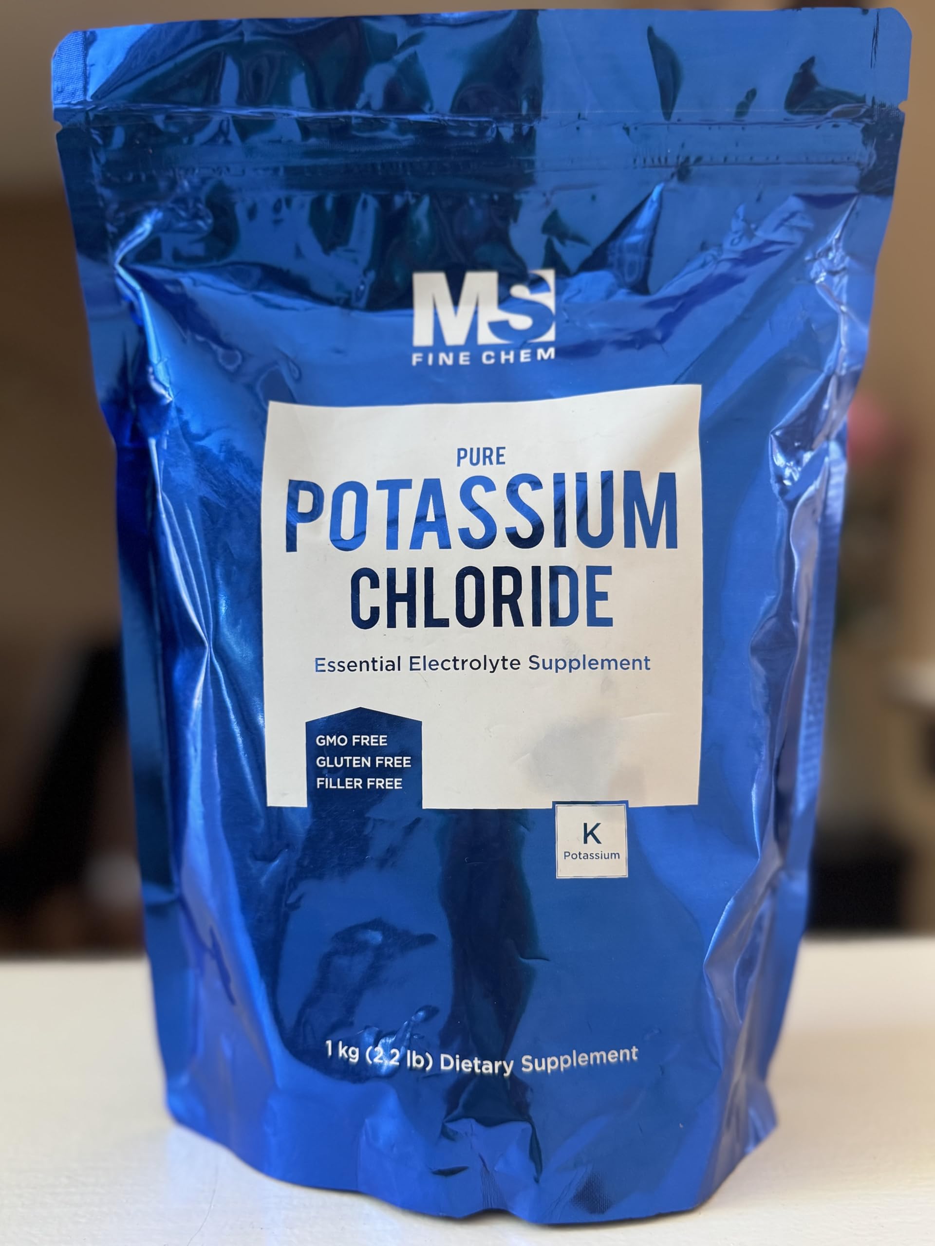 MS Finechem potassium chloride powder on kitchen counter for everyday hydration.