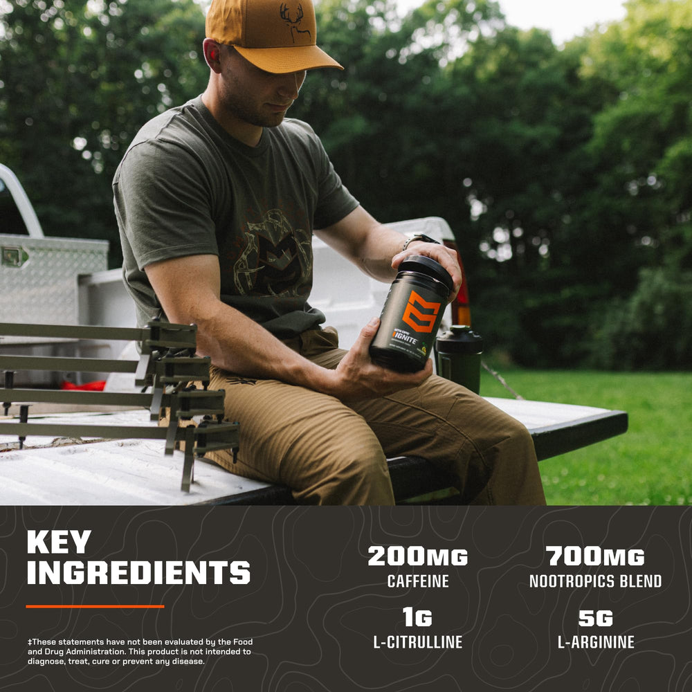 MTN OPS Ignite scoop in water cup demonstrates quick mixing and on-the-go energy.
