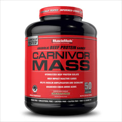 MuscleMeds Carnivor Mass bottle pour, ready to fuel workouts.