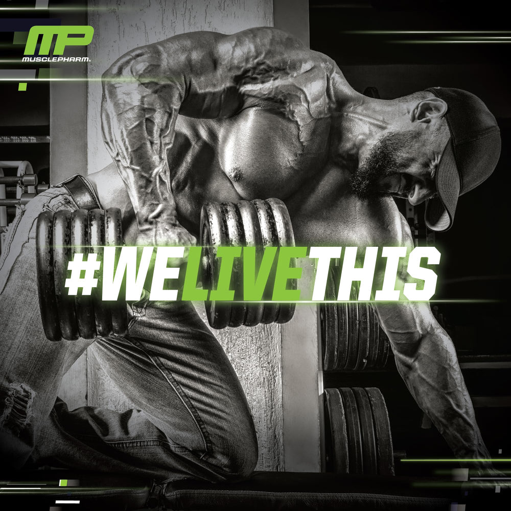 Box and tub of MusclePharm Assault on gym shelf for easy access.