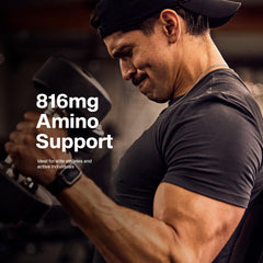 MuscleTech Platinum Multivitamin on gym bench suggesting immune support compatibility.
