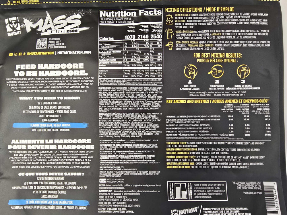 Mutant Mass Extreme Gainer ready-to-mix powder beside a spoon for quick fueling.
