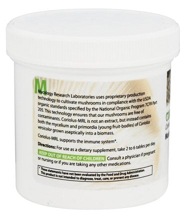 Mycology Research Labs Coriolus-MRL 90 tablets laid out beside a glass of water, simple on-the-go use