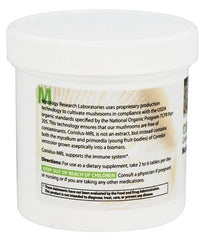 Mycology Research Labs Coriolus-MRL 90 tablets laid out beside a glass of water, simple on-the-go use