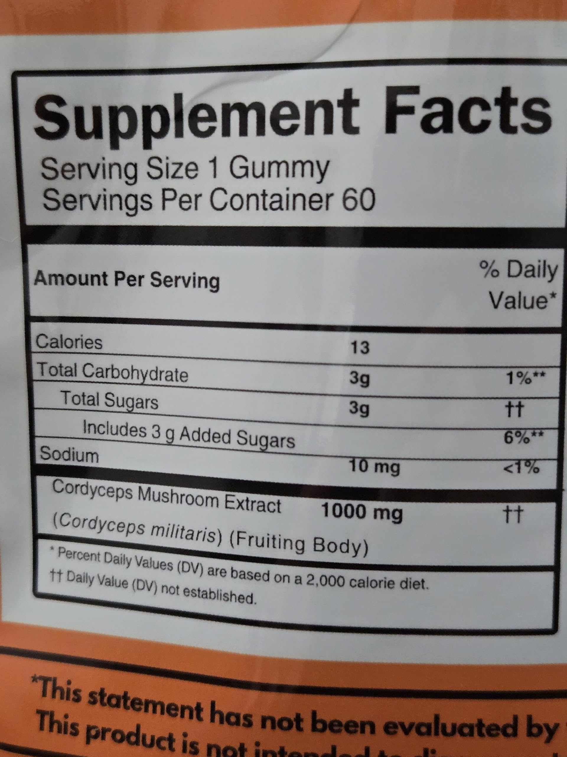 MYCOMedix Cordyceps gummies being poured from a bottle for a convenient daily dose