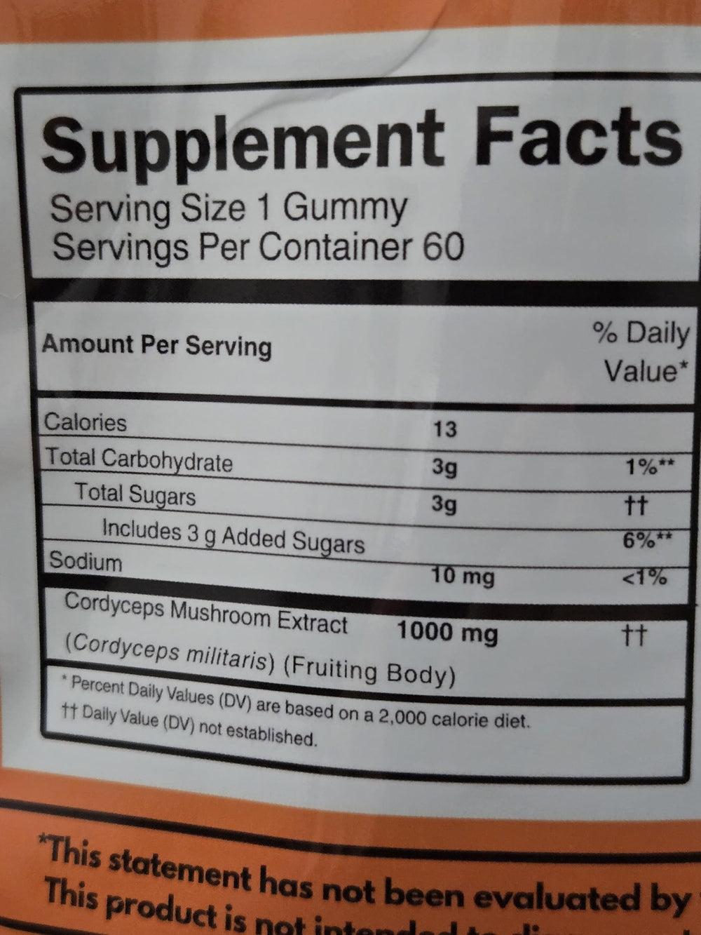 MYCOMedix Cordyceps gummies being poured from a bottle for a convenient daily dose