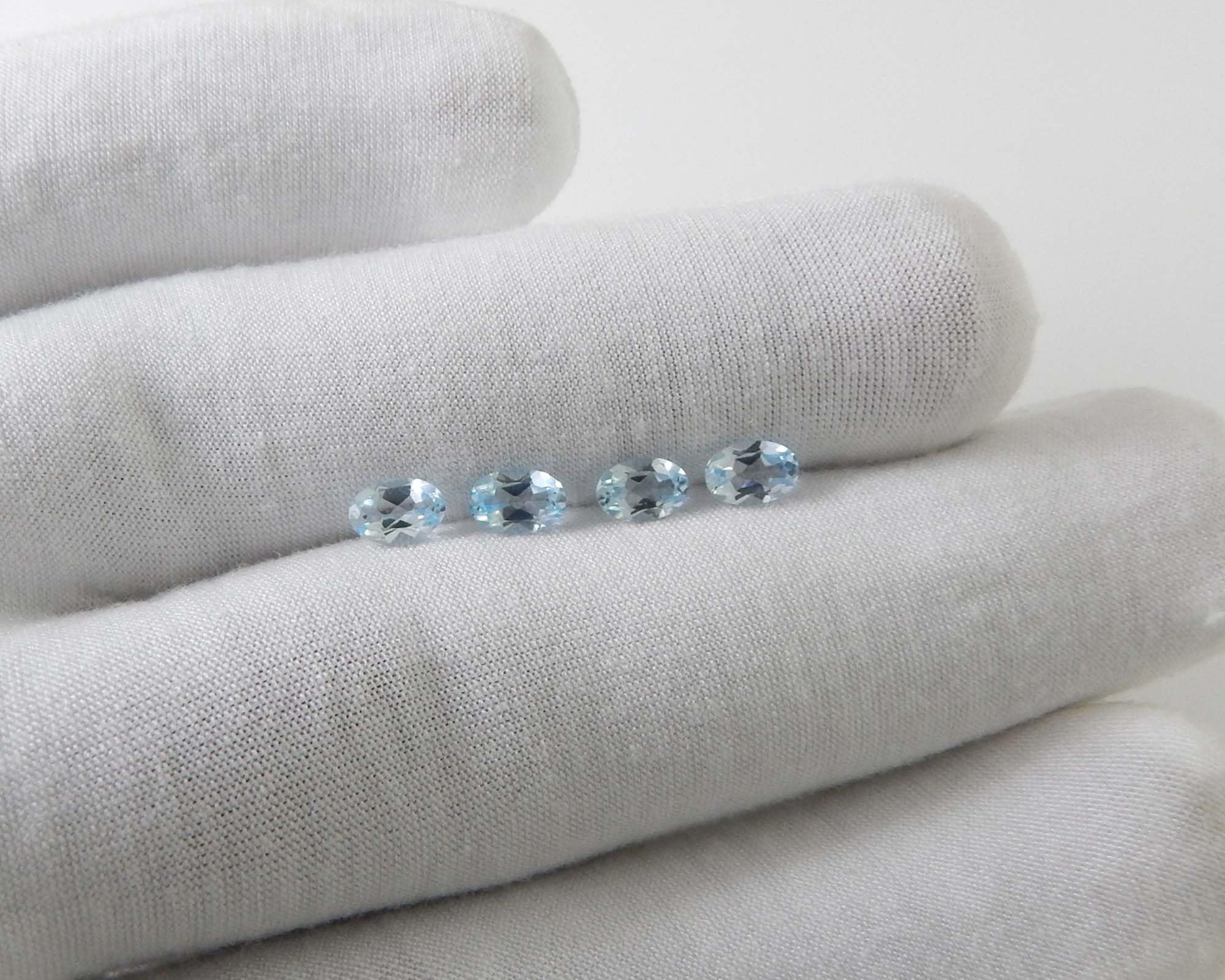 Myhealingworld blue topaz oval 4x6mm four-stone brilliant-cut detail emphasizes craftsmanship potential