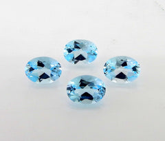 Myhealingworld blue topaz oval 4x6mm four-stone close-up highlights facets and blue brilliance