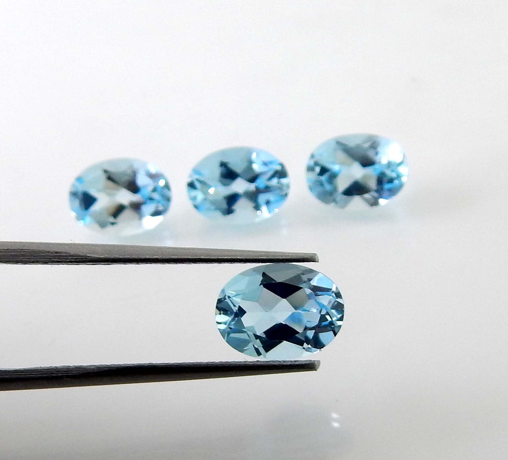 Myhealingworld blue topaz oval 4x6mm four-stone group shows consistency for designers