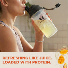 Myprotein Clear Whey Isolate Peach Mango powder pack shows convenient single-serve protein