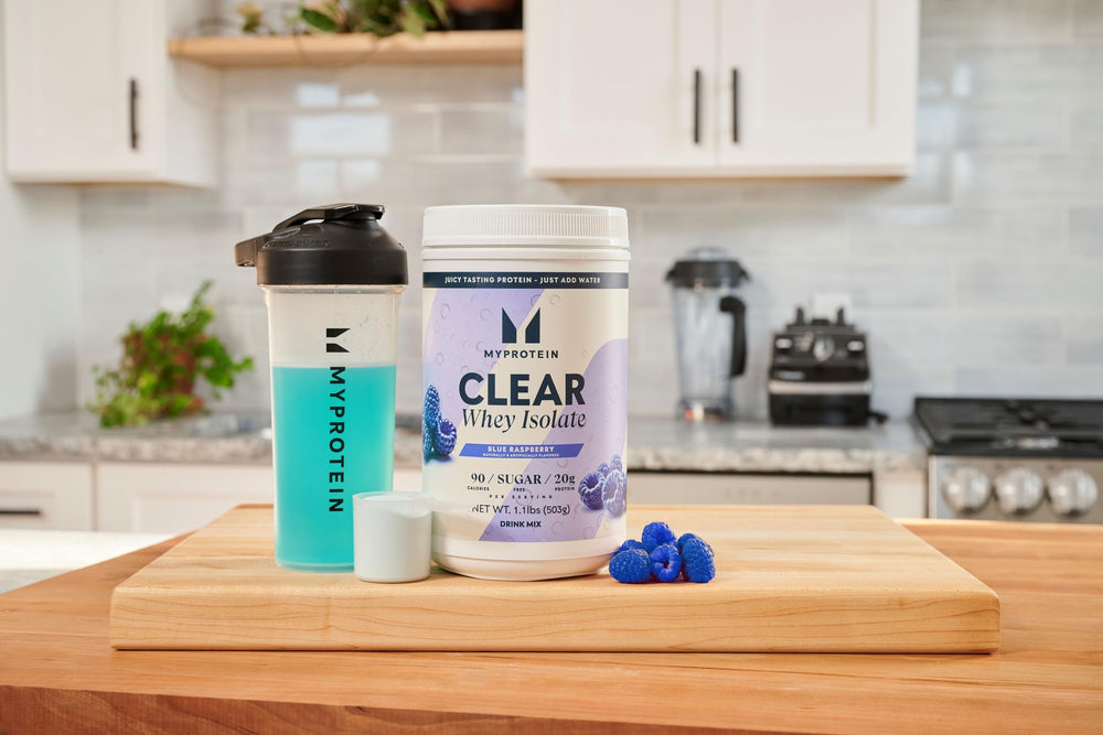 Myprotein Clear Whey Isolate scoop with water for quick protein intake.