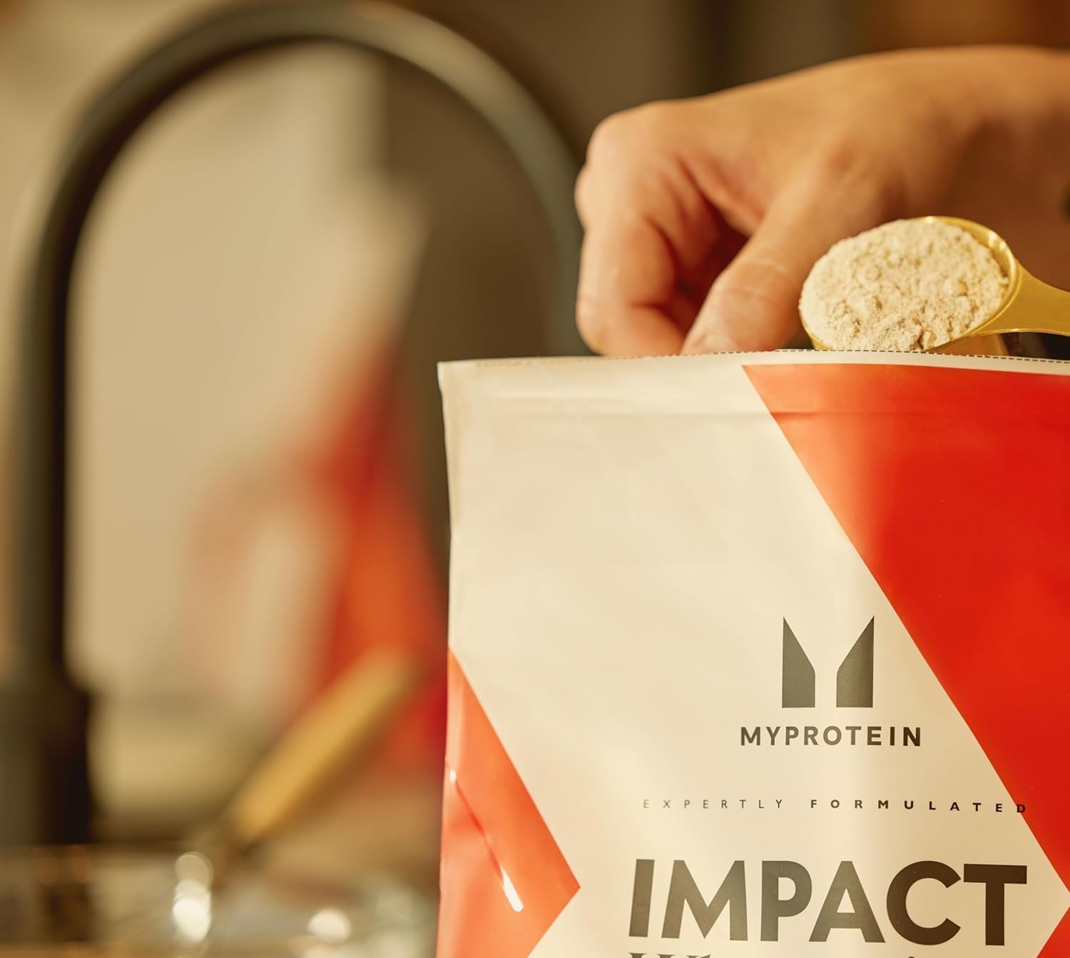 Myprotein Creatine Monohydrate label highlights vegan, dairy-free formula