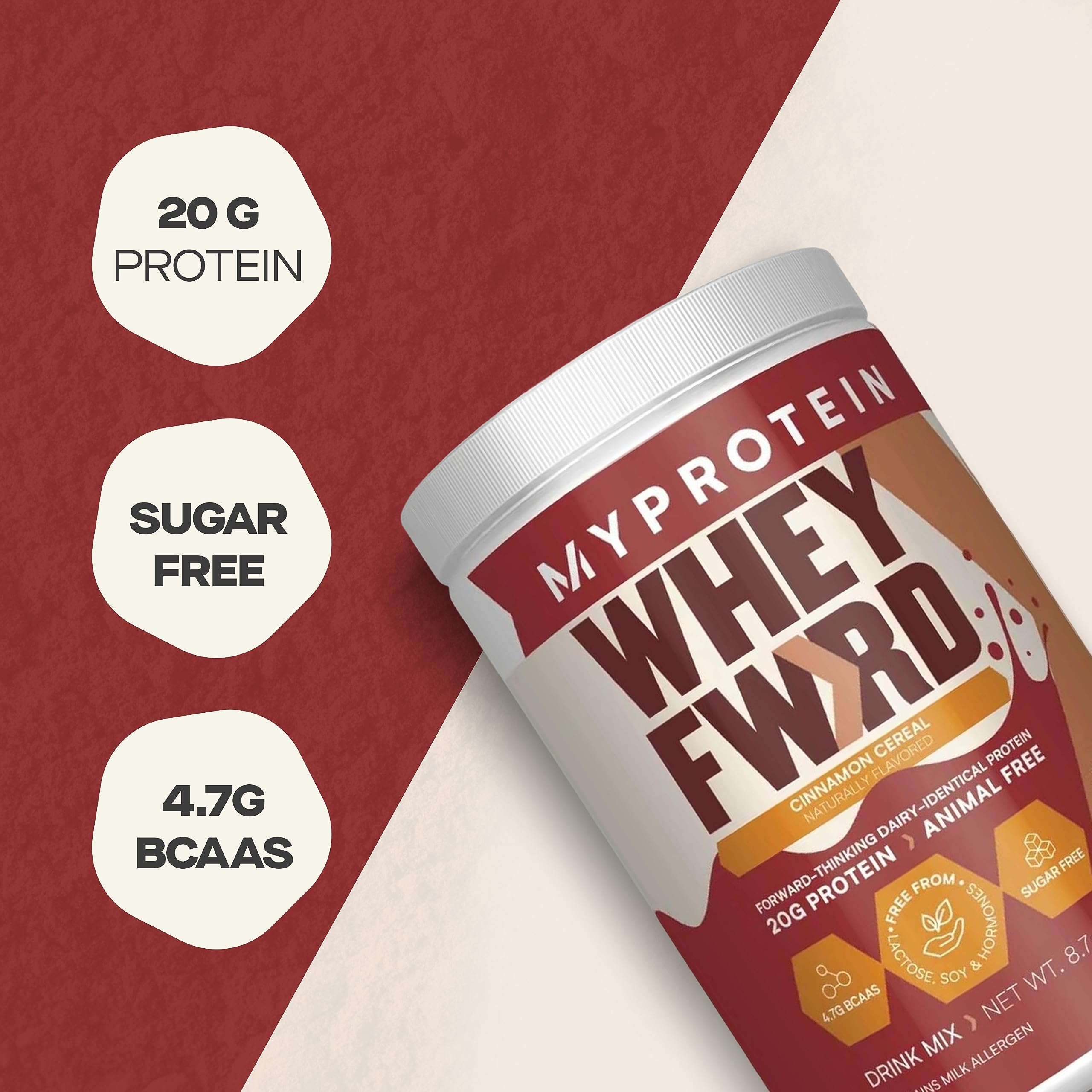 Pouring Cinnamon Cereal powder into a shaker for post-workout recovery
