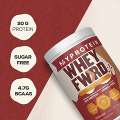 Pouring Cinnamon Cereal powder into a shaker for post-workout recovery
