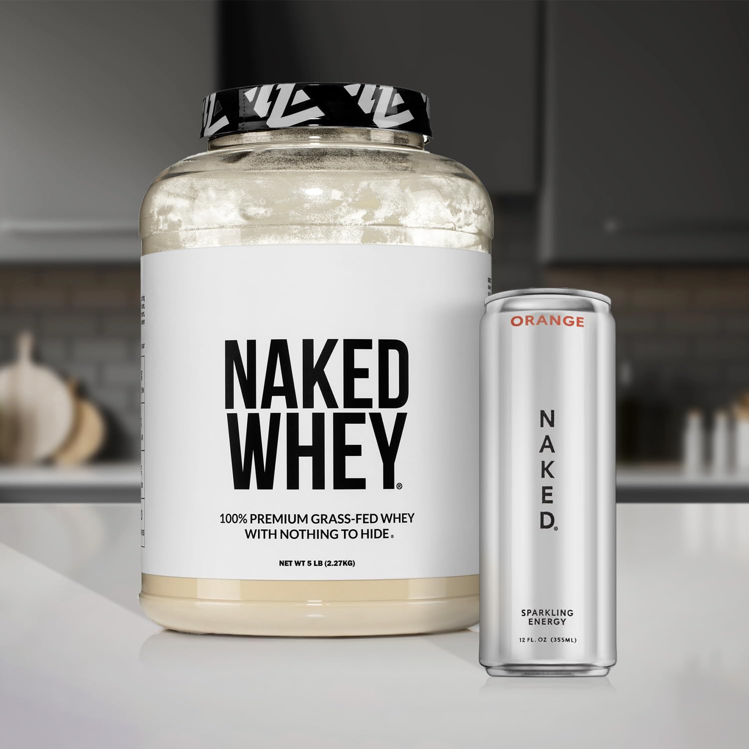 NAKED Vanilla Whey Powder serving scoop with measured portions