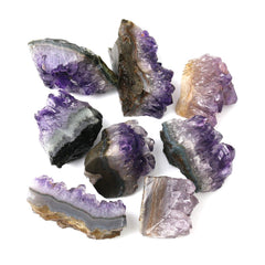 Namzi amethyst geode on shelf supporting calm ambiance and decorative feng shui.