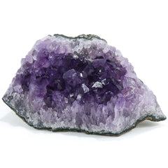 Namzi amethyst crystal geode close-up, enhances meditation ambiance and focus.