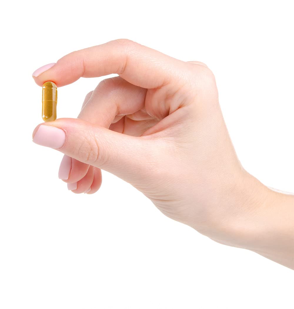 Open capsule of Nanocur to blend into smoothies or drinks.