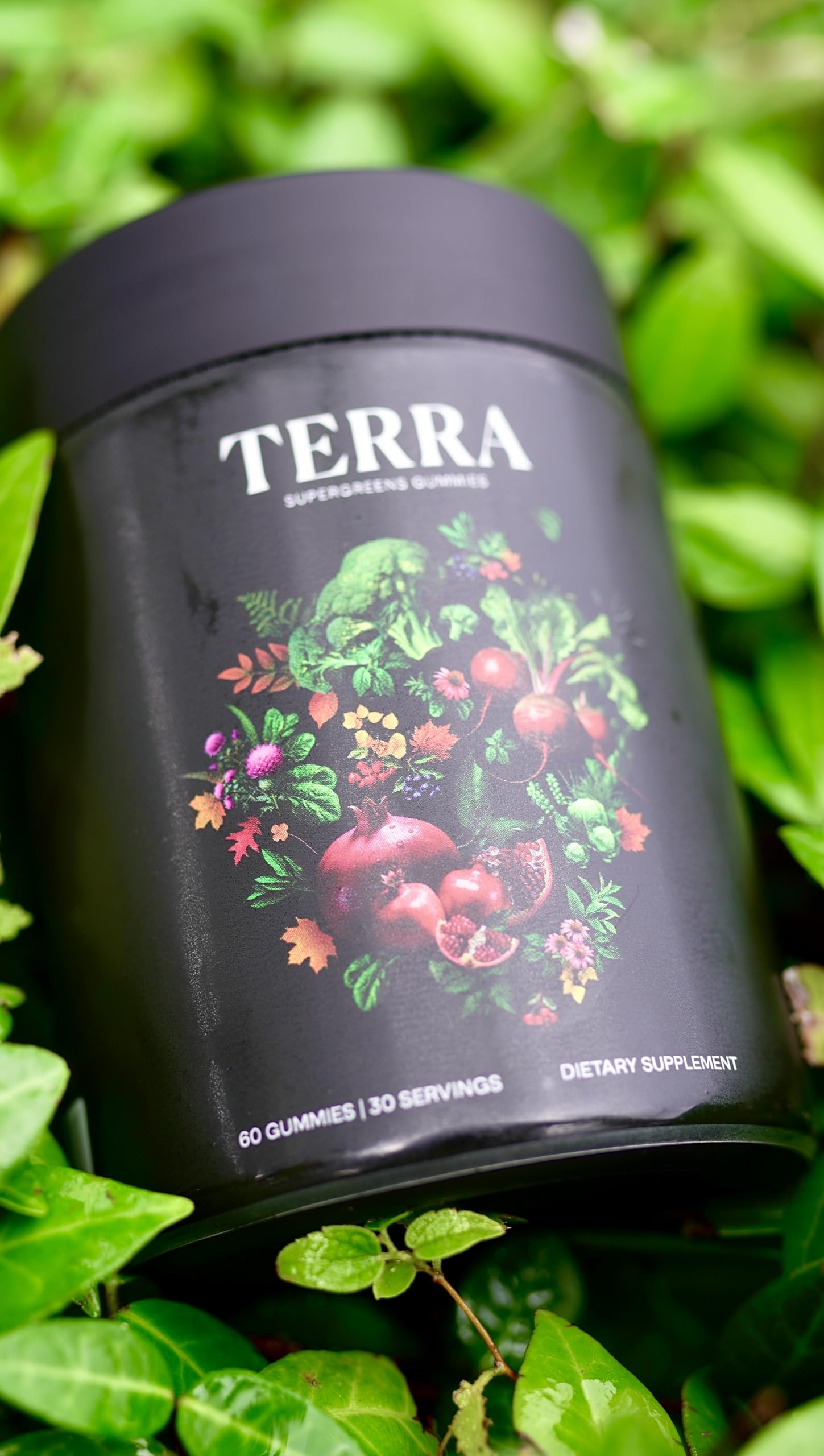 NAO Terra Supergreens gummies on-hand demonstrate portable daily supplementation.