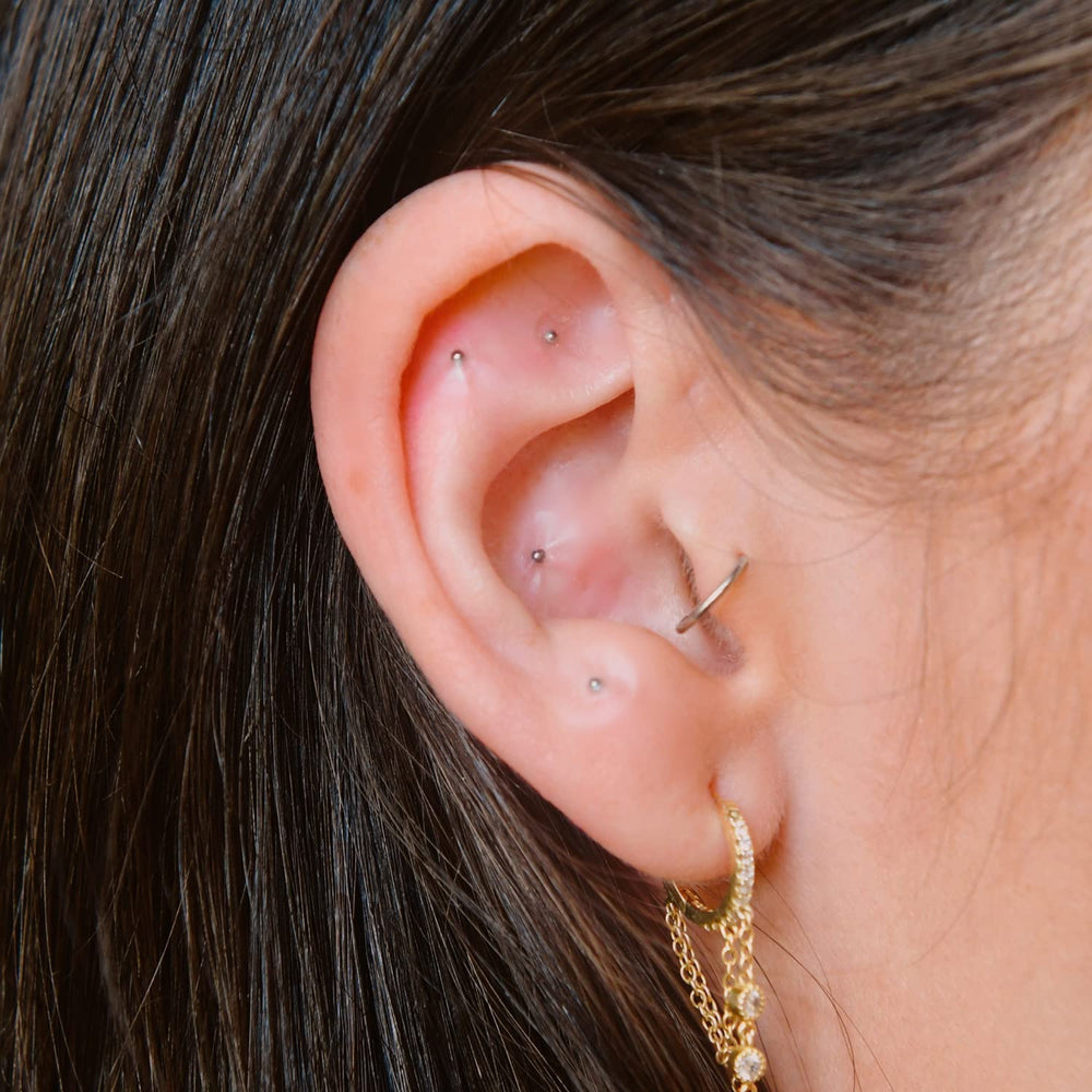 Three-day wear: NAO Wellness ear seeds stay in place during activities.
