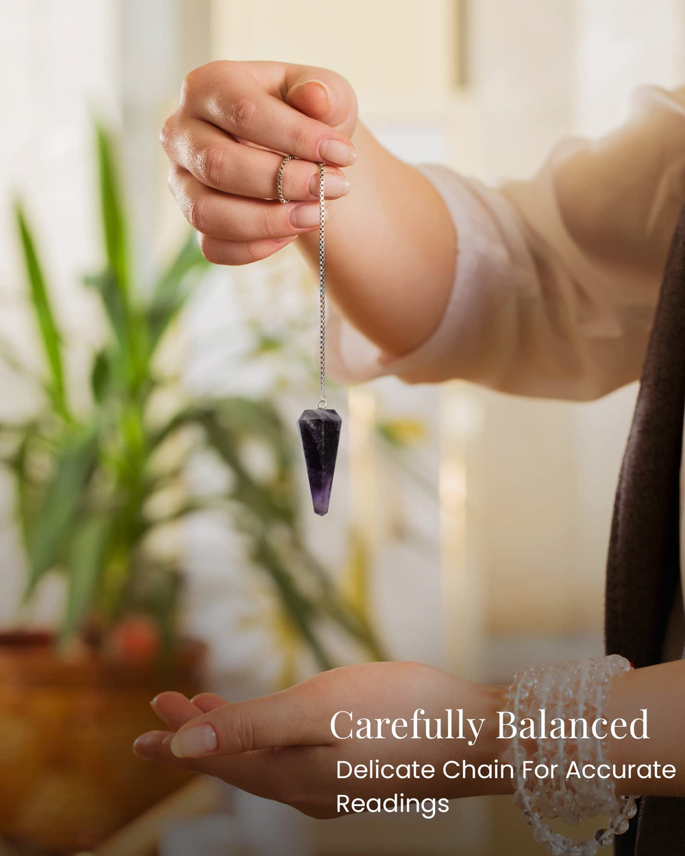 Naribabu pendulum amethyst invites calm energy during meditation.