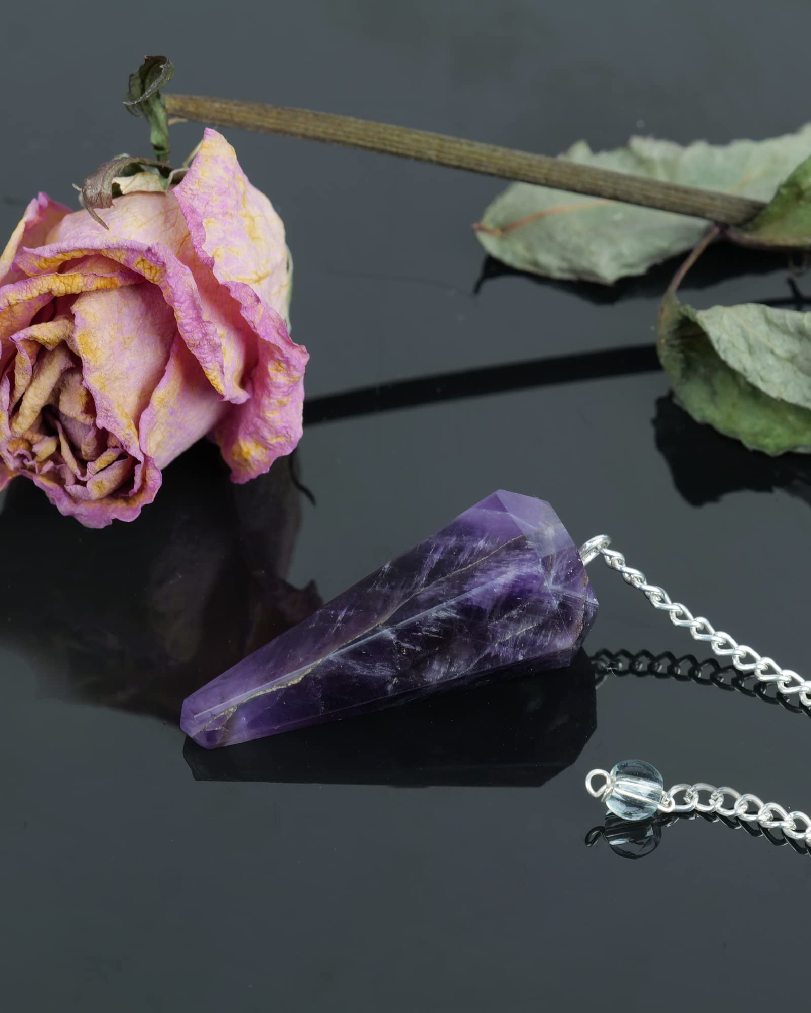 Naribabu amethyst pendulum for on-the-go insight and reflection.